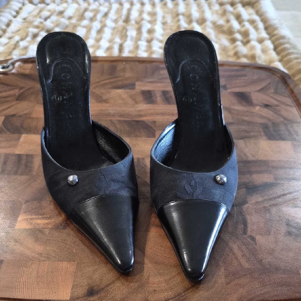 CHANEL Black Pointed Toe Slip-On Mules with Logo Cap